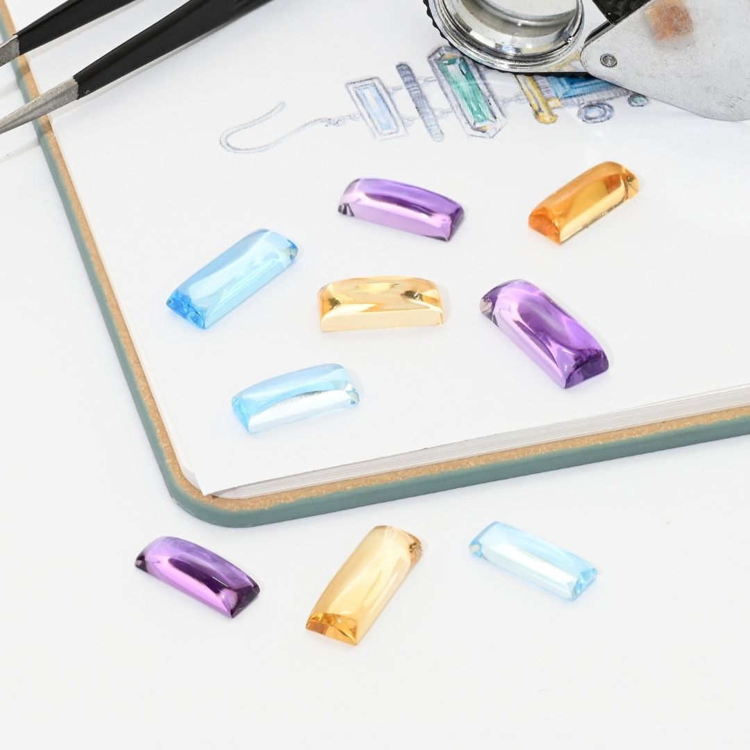 Multi-colour cabochon cut gemstones