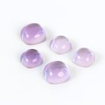 Lilac coloured amethyst and mother of pearl doublets