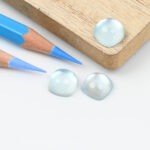 Blue topaz and mother of pearl cushion cabochon 10mm