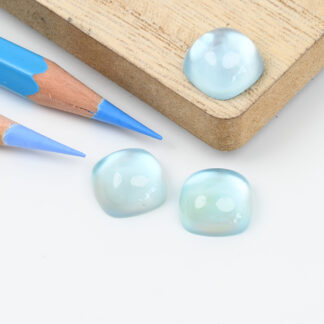 Blue topaz and mother of pearl cushion cabochon 12mm