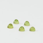Peridot and mother of pearl doublet - 4mm