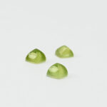 Peridot and mother of pearl sugarloaf cabochon 6mm