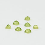 Peridot and mother of pearl sugarloaf cabochon 4.5mm