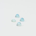 Blue topaz and mother of pearl round cabochon 6mm