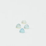 Blue topaz and mother of pearl round cabochon 4mm