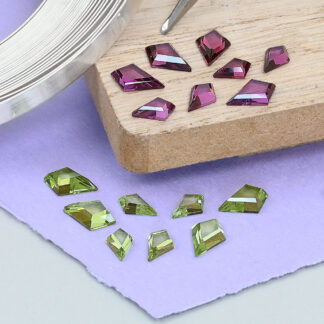 Peridot and rhodolite garnet kite cut gemstones