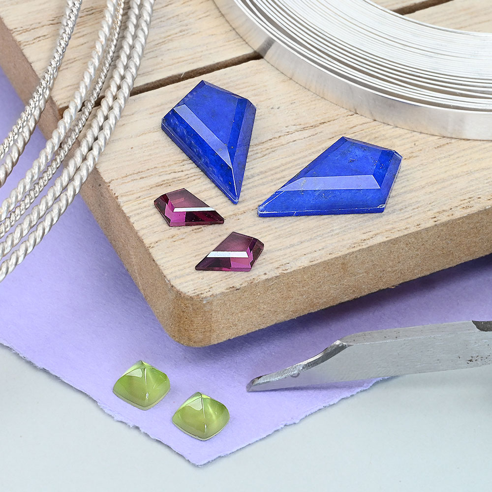 Lapis and quartz kite cut doublets, peridot and mother of pearl sugarloaf doublets and rhodolite garnet kite cuts