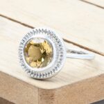 Handmade bezel set ring with halo - front view